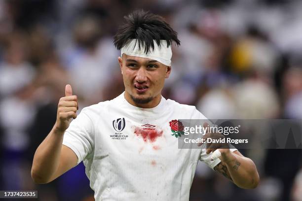 Marcus Smith of England celebrates victory, as blood and bandages can be seen, after the Rugby World Cup France 2023 Quarter Final match between...