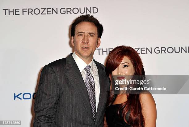 Alice Kim and Nicolas Cage attend the UK Premiere of 'The Frozen Ground' at Vue West End on July 17, 2013 in London, England.