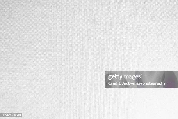 close-up of the texture of white fabric. the background is made of textile. - linhas texteis imagens e fotografias de stock