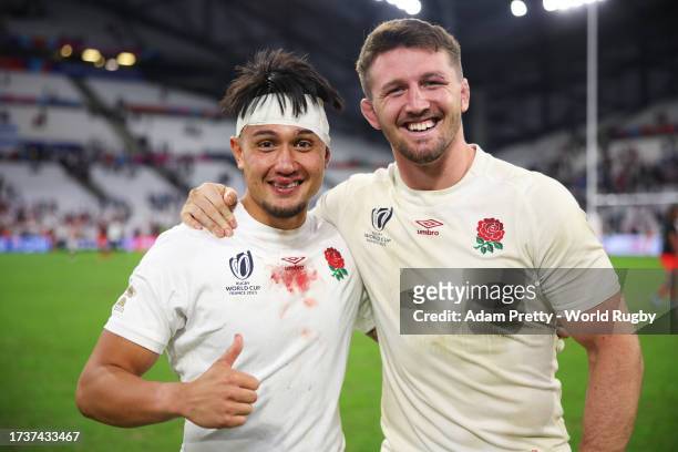 Marcus Smith poses for a photograph with Tom Curry of England after the Rugby World Cup France 2023 Quarter Final match between England and Fiji at...