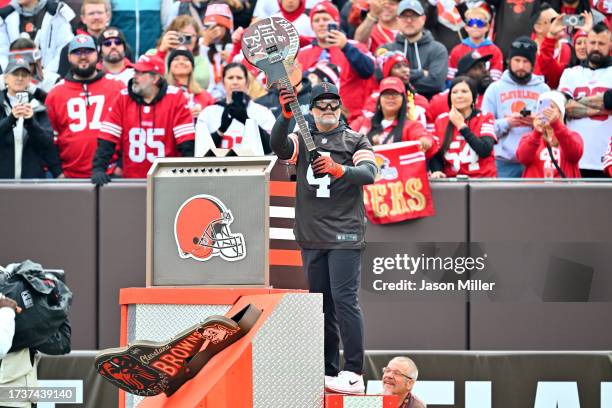 Former Cleveland Browns kicker Phil Dawson pumps up the crowd prior to a game against the San Francisco 49ers at Cleveland Browns Stadium on October...