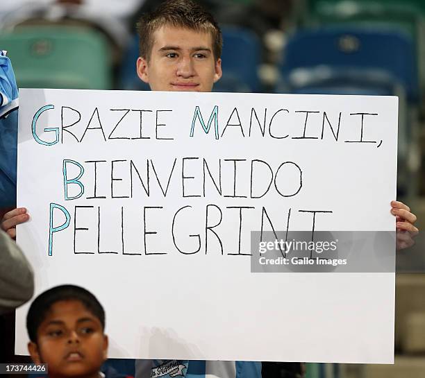 Young fan during the Manchester City training session at Moses Mabhida Stadium on July 17, 2013 in Durban, South Africa.