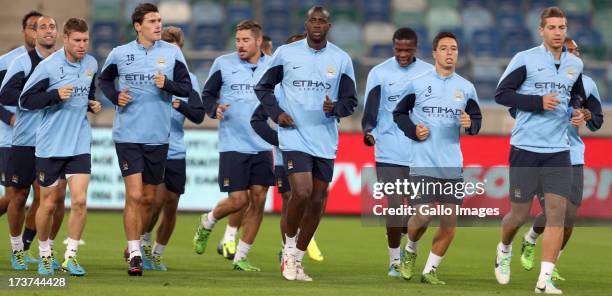 Manchester City players during a training session at Moses Mabhida Stadium on July 17, 2013 in Durban, South Africa.