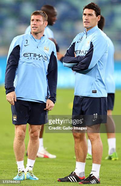 James Milner of Manchester City with Gareth Barry of Manchester City during the Manchester City training session at Moses Mabhida Stadium on July 17,...