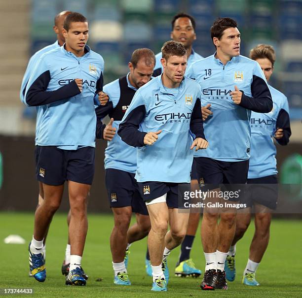 Manchester City players during a training session at Moses Mabhida Stadium on July 17, 2013 in Durban, South Africa.