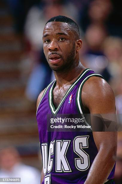 Terrell Brandon of the Milwaukee Bucks looks on against the Sacramento Kings during a game played on November 15, 1996 at Arco Arena in Sacramento,...