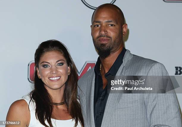 Pro Soccer Player Hope Solo and Former NFL Player Jerramy Stevens attend the ESPN's 5th Annual Body At ESPYS at Lure on July 16, 2013 in Hollywood,...