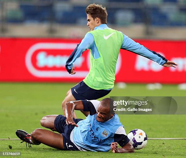 Vincent Kompany of Manchester City making a tackle during the Manchester City training session at Moses Mabhida Stadium on July 17, 2013 in Durban,...