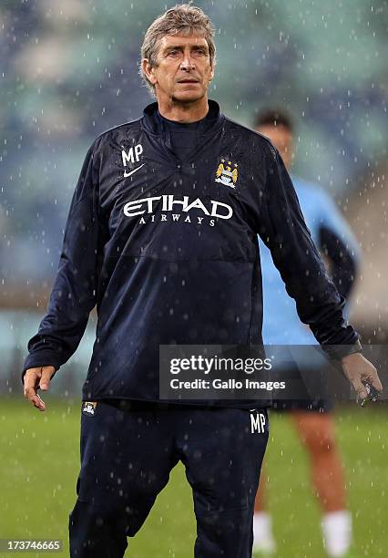 Manuel Pellegrini Manger of Manchester City during the Manchester City training session at Moses Mabhida Stadium on July 17, 2013 in Durban, South...