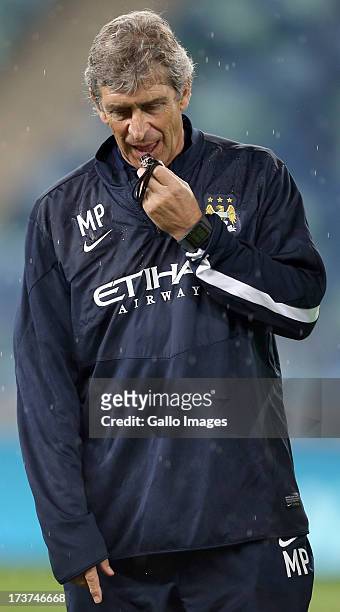 Manuel Pellegrini Manger of Manchester City during the Manchester City training session at Moses Mabhida Stadium on July 17, 2013 in Durban, South...
