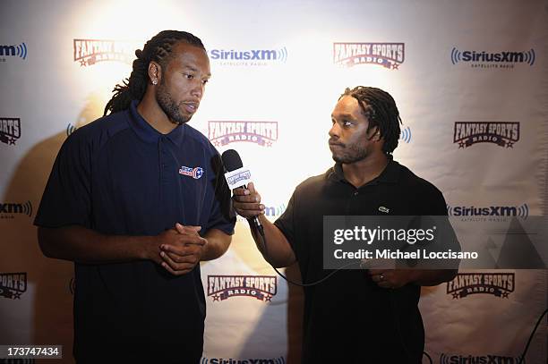 Professional Football players Larry Fitzgerald and Maurice Jones-Drew attend the SiriusXM Celebrity Fantasy Football Draft at Hard Rock Cafe - Times...