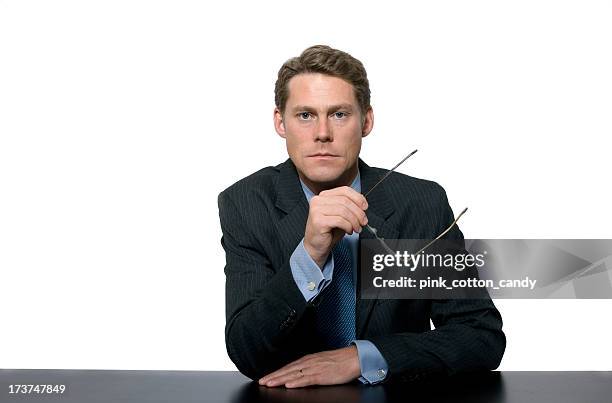 serious newscaster-type man - newsreader stock pictures, royalty-free photos & images