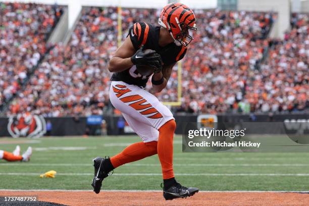 Andrei Iosivas of the Cincinnati Bengals catches a pass for his first NFL touchdown during the second quarter against the Seattle Seahawks at Paycor...