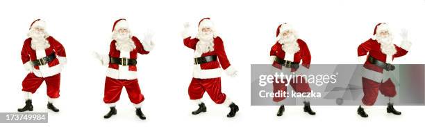 dancing santa isolated on white - santa waving stock pictures, royalty-free photos & images