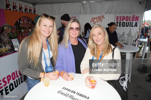 Guests visit Aperol Spritz booth the Food Network New York City Wine & Food Festival presented by Capital One - Grand Tasting featuring Culinary...