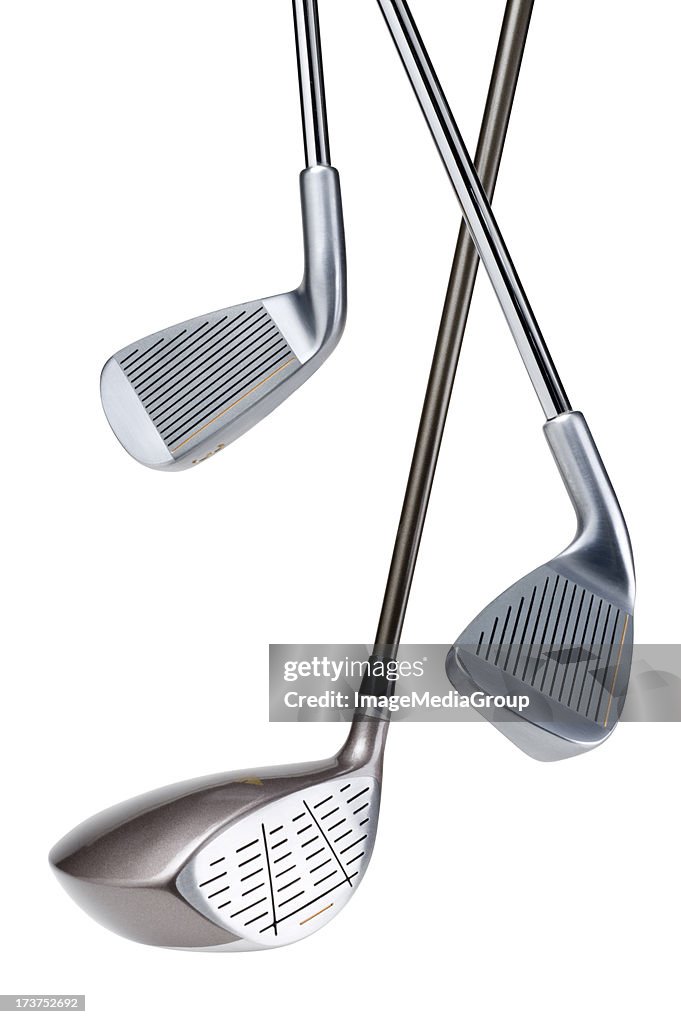 Three different types of golf clubs on a white background