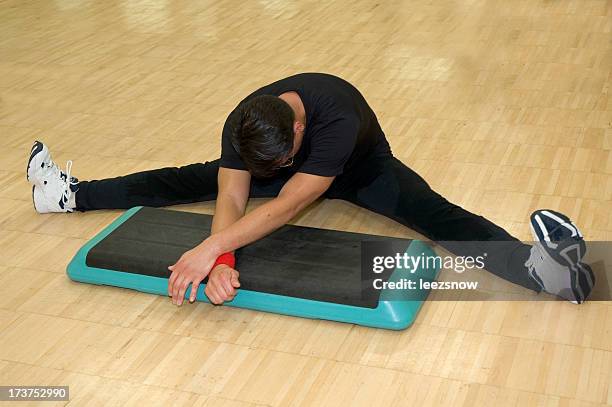 stretching in fitness class - liquid dance club stock pictures, royalty-free photos & images
