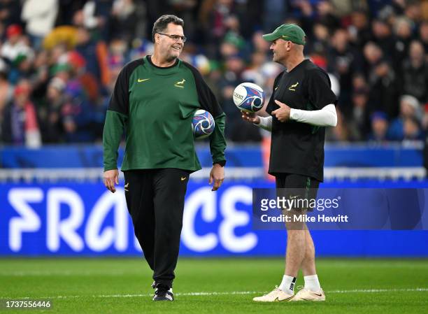 Jacques Nienaber, Head Coach of South Africa, speaks with Rassie Erasmus, Coach of South Africa, prior to the Rugby World Cup France 2023 Quarter...