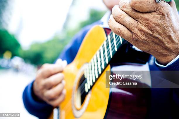 guitarist on the streets of buenos aires - argentina tango stock pictures, royalty-free photos & images