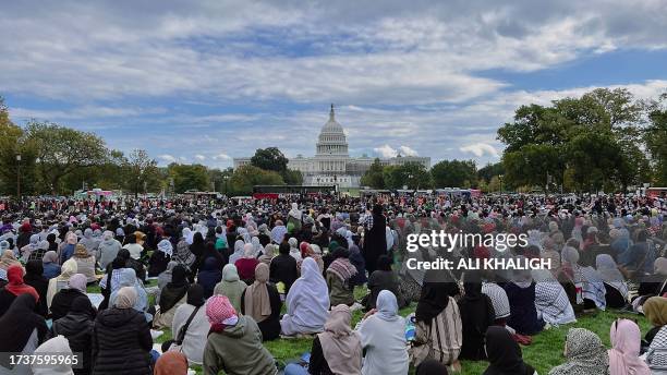 Washington D.C, U.S. Muslims gather to pray on the front of the Capitol Building in Washington.