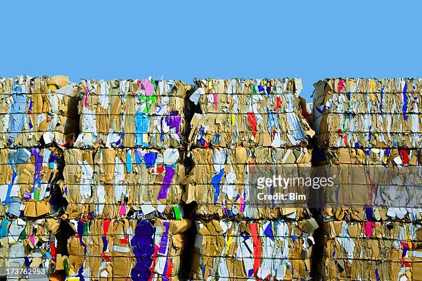 bundled cardboard for recycling - landfill stock pictures, royalty-free photos & images