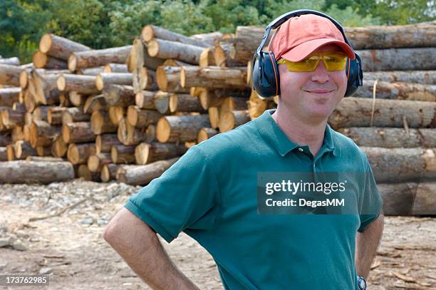 man at wood mill - logging mill stock pictures, royalty-free photos & images