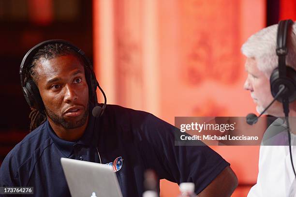 Professional Football players Larry Fitzgerald and SiriusXM radio host Steve Phillips attend the SiriusXM Celebrity Fantasy Football Draft at Hard...