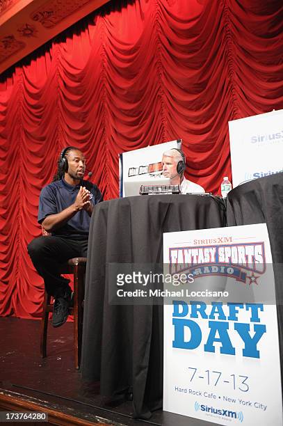 Professional Football player Larry Fitzgerald and SiriusXM radio host Steve Phillips attend the SiriusXM Celebrity Fantasy Football Draft at Hard...
