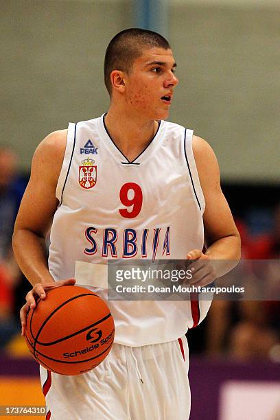 Vojislav Stojanovic of Serbia runs with the ball in the Boys Basketball match between Croatia and Serbia on Day 3 of the European Youth Olympic...
