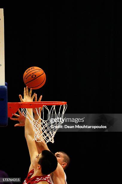 Vojislav Stojanovic of Serbia and Ivica Zubac of Croatia battle for the rebound in the Boys Basketball match between Croatia and Serbia on Day 3 of...