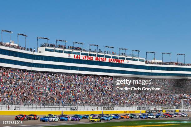 Christopher Bell, driver of the Rheem/Smurfit Kappa Toyota, leads the field to start the NASCAR Cup Series South Point 400 at Las Vegas Motor...