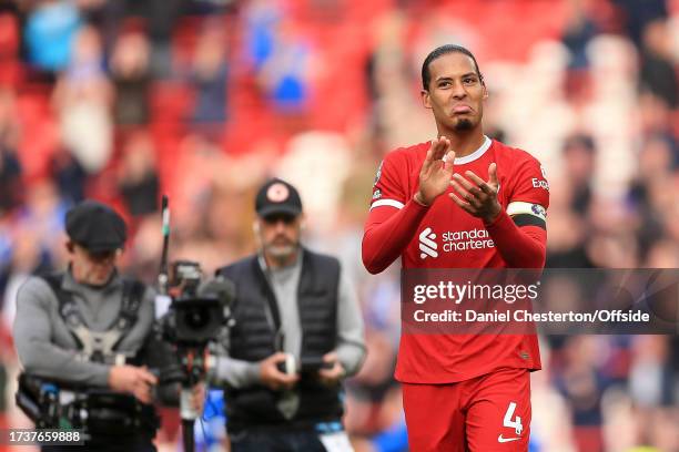 Virgil van Dijk of Liverpool celebrates after the Premier League match between Liverpool FC and Everton FC at Anfield on October 21, 2023 in...