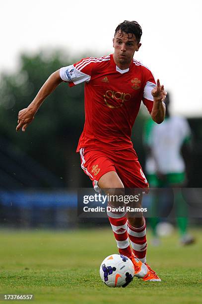 Jay Rodriguez of Southampton runs with the ball during a friendly match between Southampton FC and UE Llagostera at the Josep Pla i Arbones Stadium...