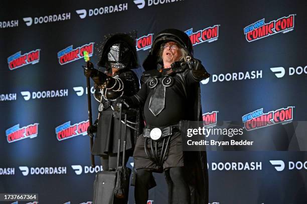 Contestants pose as Dark Helmet at the Cosplay Central Costume Showcase during New York Comic Con 2023 - Day 4 at Javits Center on October 15, 2023...