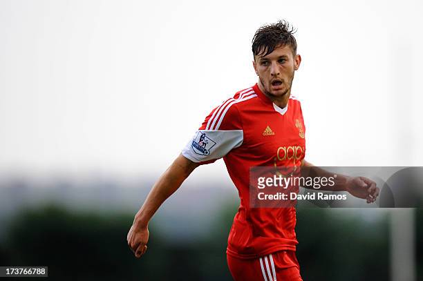 Adam Lallana of Southampton looks on during a friendly match between Southampton FC and UE Llagostera at the Josep Pla i Arbones Stadium on July 17,...
