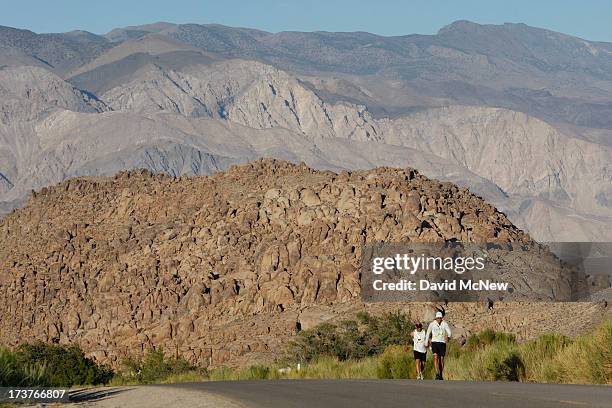 Lane Vogel of Jacksonville, Florida ascends Whitney Portal Road through the Alabama Hills toward the finish of the AdventurCORPS Badwater 135...