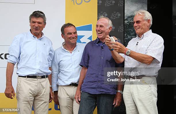 Bernard Thevenet, Bernard Hinault, Joop Zoetemelk, Jan Janssen stand on the podium after stage seventeen of the 2013 Tour de France, a 32KM...