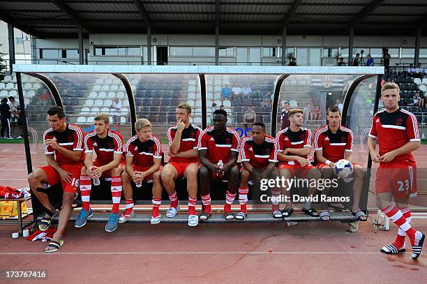 Southampton players sit on the bench before a friendly match between Southampton FC and UE Llagostera at the Josep Pla i Arbones Stadium on July 17,...