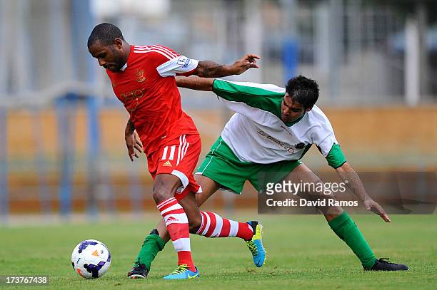 Jason Puncheon Southampton duels for the ball with Eloy Gila of UE Llagostera during a friendly match between Southampton FC and UE Llagostera at the...