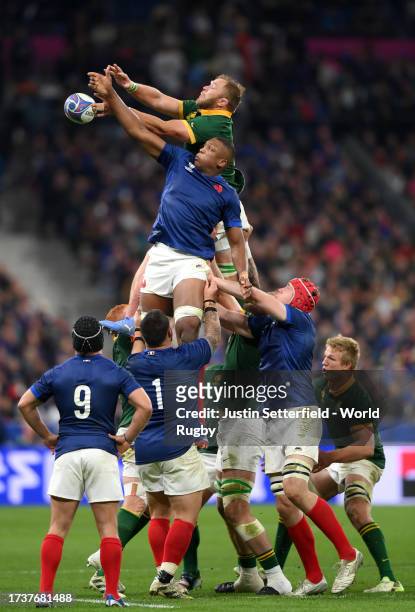 Duane Vermeulen of South Africa and Cameron Woki of France contest the line out during the Rugby World Cup France 2023 Quarter Final match between...