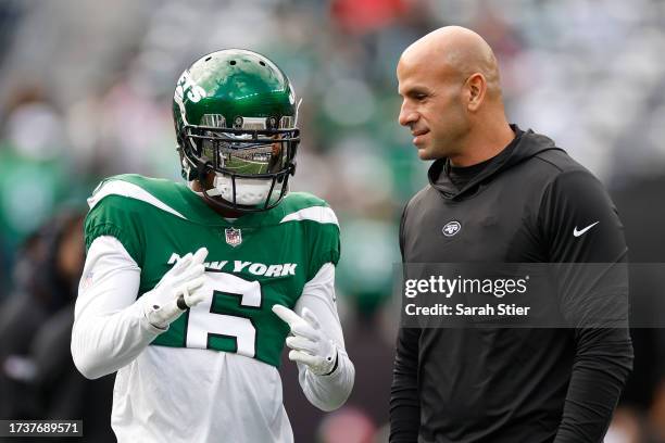 Mecole Hardman Jr. #6 of the New York Jets speaks with head coach Robert Saleh before the game against the Philadelphia Eagles at MetLife Stadium on...