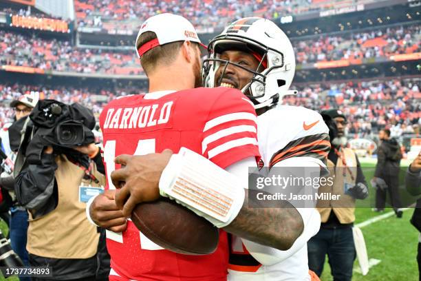Sam Darnold of the San Francisco 49ers and PJ Walker of the Cleveland Browns hug after Cleveland's 19-17 win at Cleveland Browns Stadium on October...