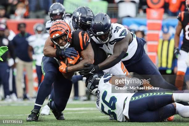 Joe Mixon of the Cincinnati Bengals runs the ball during the second half in the game against the Seattle Seahawks at Paycor Stadium on October 15,...