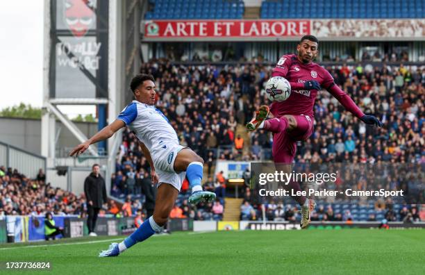 Blackburn Rovers' James Hill is tackled by Cardiff City's Karlan Grant during the Sky Bet Championship match between Blackburn Rovers and Cardiff...