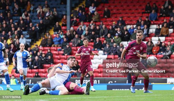 Blackburn Rovers' Joseph Rankin-Costello shoots for goal under pressure from Cardiff City's Mark McGuinness during the Sky Bet Championship match...