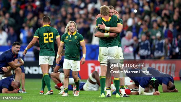 Pieter-Steph Du Toit and RG Snyman of South Africa embrace as they celebrate victory at full-time following the Rugby World Cup France 2023 Quarter...