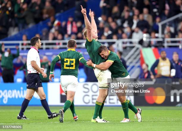 Pieter-Steph Du Toit and Handre Pollard of South Africa celebrate victory at full-time following the Rugby World Cup France 2023 Quarter Final match...