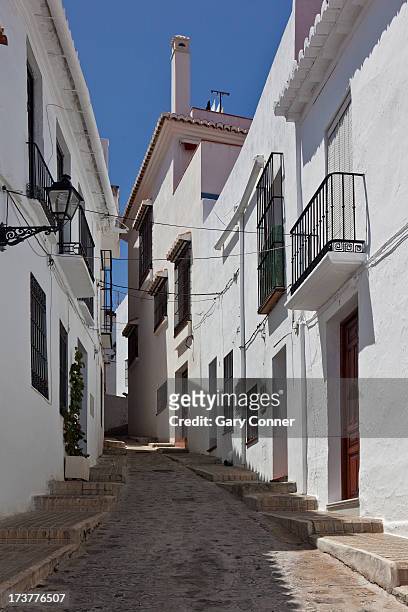narrow hillside street scene in salobrena - salobreña stock pictures, royalty-free photos & images