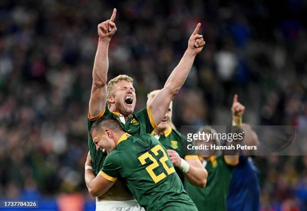 Pieter-Steph Du Toit and Handre Pollard of South Africa celebrate victory at full-time following the Rugby World Cup France 2023 Quarter Final match...