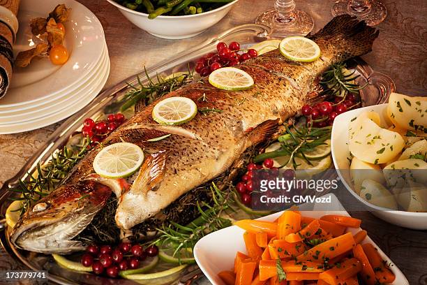 christmas dinner - fish dinner stock pictures, royalty-free photos & images